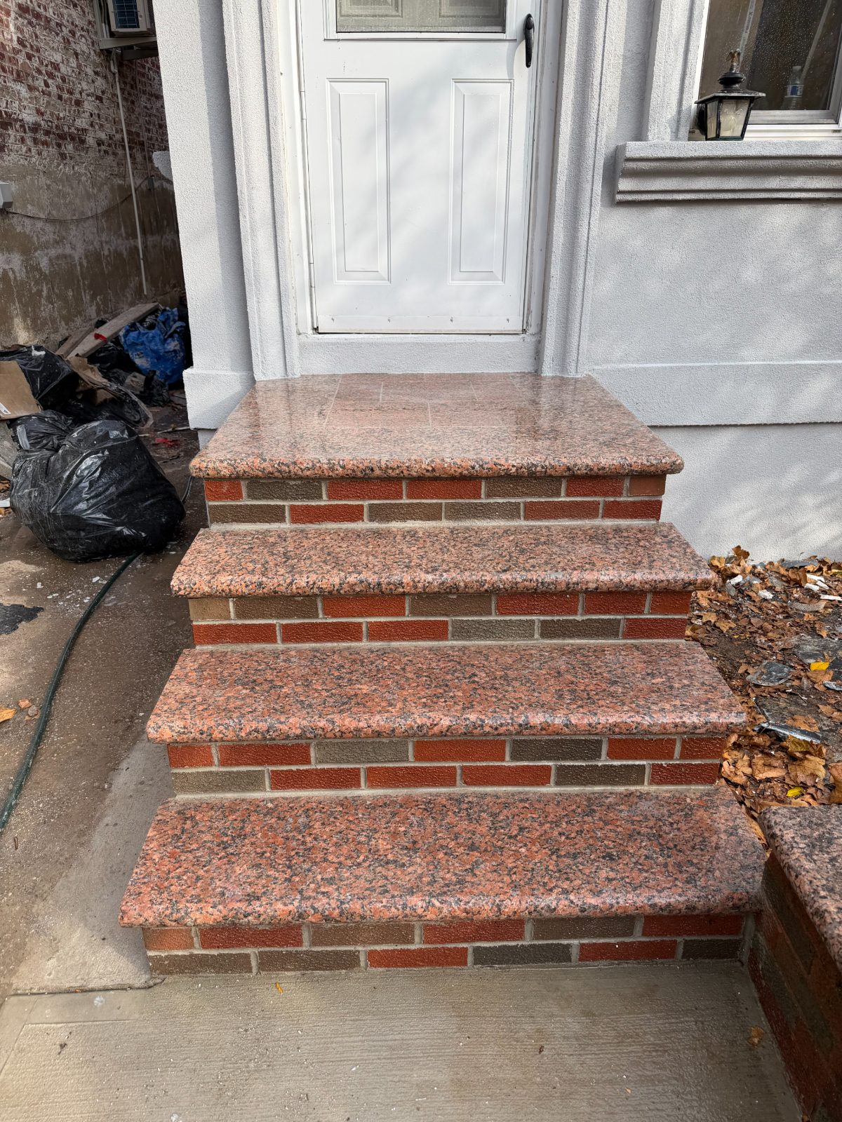 Red granite front steps
